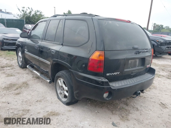 2006 GMC Envoy SLT with VIN 1GKDS13S462241866, listed as a IAAI auction lot 41943322 with 90,695 mi miles. Bid and sale history available at carsss.com. Image 3.