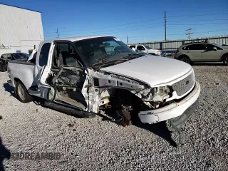 1999 Ford F-150 с VIN 1FTRX07W5XKB95198, выставлен на аукционе Copart как лот 41478385 с пробегом Не указан миль и Списание • Salvage title. История ставок и продаж доступна на DreamBid. Изображение 11.