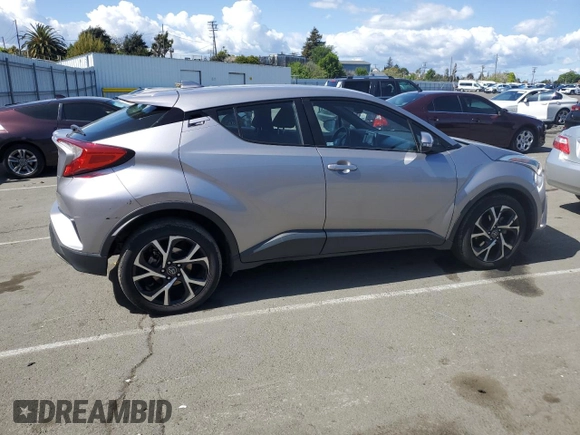 2018 Toyota C-HR XLE with VIN NMTKHMBX6JR047937, listed as a Copart auction lot 51705805 with 128,543 mi miles and Salvage Title. Bid and sale history available at DreamBid. Image 3.