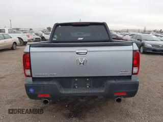 2023 Honda Ridgeline Sport z VIN 5FPYK3F16PB049866, wystawiony jako IAAI lot #41068916 z przebiegiem Nie podano mil oraz . Historia ofert i sprzedaży dostępna na DreamBid. Obrazek 16.