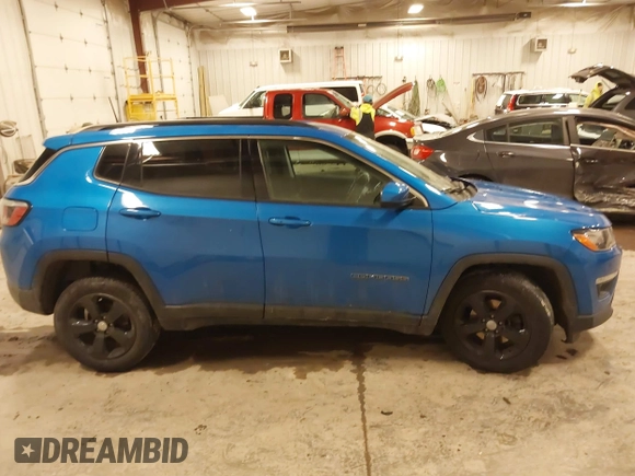 2018 Jeep Compass Altitude with VIN 3C4NJDBB5JT345165, listed as a IAAI auction lot 41618844 with 66,226 mi miles and . Bid and sale history available at carsss.com. Image 13.