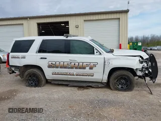 2020 Chevrolet Tahoe Commercial with VIN 1GNLCDEC7LR199179, listed as a IAAI auction lot 41502623 with 87,271 mi miles and . Bid and sale history available at DreamBid. Image 13.