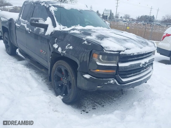 2018 Chevrolet Silverado 1500 LT with VIN 1GCVKRECXJZ116262, listed as a IAAI auction lot 41572273 with 221,864 mi miles. Bid and sale history available at carsss.com. Image 1.