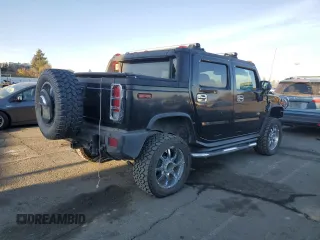 2005 Hummer H2 SUT with VIN 5GRGN22U15H101289, listed as a Copart auction lot 84107974 with 0 mi miles and Salvage Title. Bid and sale history available at carsss.com. Image 3.