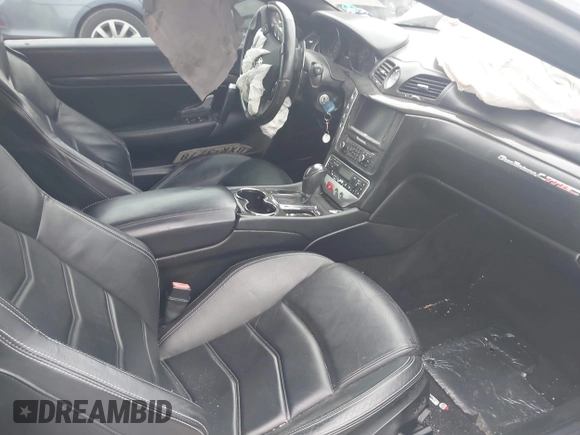 2013 Maserati GranTurismo Convertible Sport with VIN ZAM45VMA9D0070293, listed as a IAAI auction lot 41241020 with 69,156 mi miles. Bid and sale history available at carsss.com. Image 5.