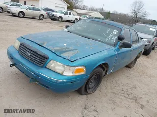 2000 Ford Crown Victoria Police Pkg Police Interceptor with VIN 2FAFP71W4YX136846, listed as a IAAI auction lot 41715363 with 335,956 mi miles. Bid and sale history available at carsss.com. Image 2.