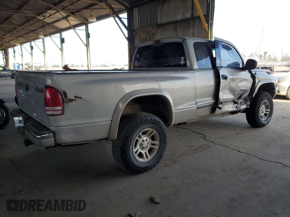 1999 Dodge Dakota SLT with VIN 1B7GG22Y0XS259031, listed as a Copart auction lot 87972505 with 153,354 mi miles and Salvage Title. Bid and sale history available at DreamBid. Image 3.