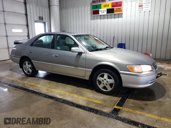 2001 Toyota Camry CE z VIN JT2BG22K410558183, wystawiony jako Copart lot #55600625 z przebiegiem 69 689 mil mil oraz Szkoda całkowita • Salvage title. Historia ofert i sprzedaży dostępna na DreamBid. Obrazek 4.