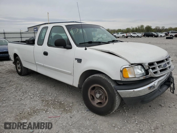 1999 Ford F-150 with VIN 2FTRX17W3XCA68816, listed as a Copart auction lot 53080755 with 201,501 mi miles and Salvage Title. Bid and sale history available at DreamBid. Image 4.