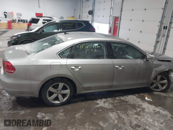 2013 Volkswagen Passat SE w/Sunroof & Nav with VIN 1VWBP7A30DC150018, listed as a IAAI auction lot 41580416 with 75,231 mi miles. Bid and sale history available at carsss.com. Image 14.