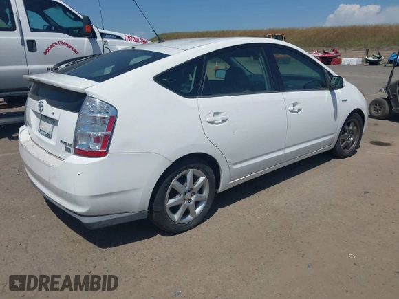 2007 Toyota Prius with VIN JTDKB20U577650008, listed as a IAAI auction lot 42171792 with 180,466 mi miles and . Bid and sale history available at DreamBid. Image 4.