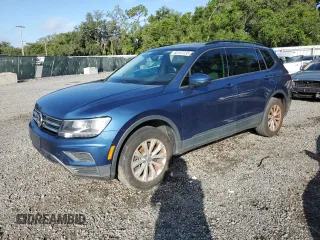 2020 Volkswagen Tiguan S with VIN 3VV1B7AX3LM052051, listed as a Copart auction lot 65157235 with 216,292 mi miles and Clean title. Bid and sale history available at DreamBid. Image 1.
