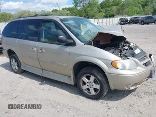 2005 Dodge Caravan SXT z VIN 2D4GP44L85R596416, wystawiony jako IAAI lot #42202922 z przebiegiem 99 117 mil mil oraz . Historia ofert i sprzedaży dostępna na DreamBid. Obrazek 1.