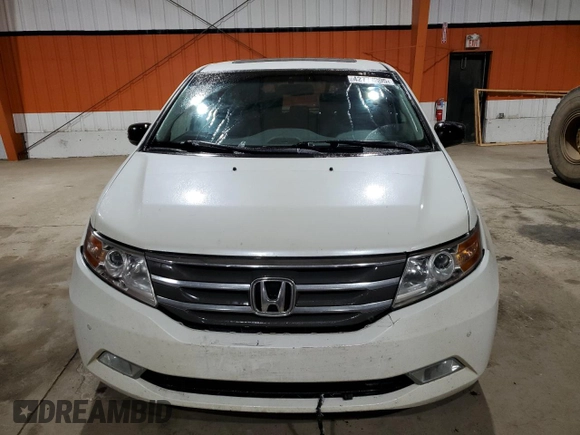 2012 Honda Odyssey Touring with VIN 5FNRL5H94CB508363, listed as a Copart auction lot 42777305 with 158,040 mi miles and Salvage Title. Bid and sale history available at DreamBid. Image 5.