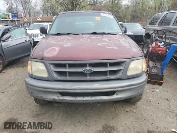1998 Ford F-150 with VIN 1FTZX1727WNB55284, listed as a Copart auction lot 51781465 with 258,600 mi miles and Salvage title. Bid and sale history available at DreamBid. Image 5.