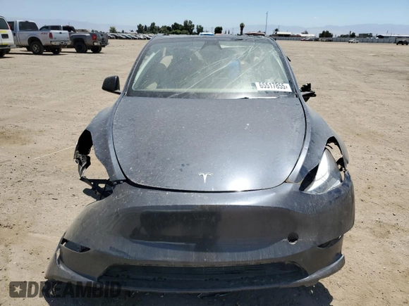 2024 Tesla Model Y z VIN 7SAYGDED6RF204899, wystawiony jako Copart lot #65517855 z przebiegiem Nie podano mil oraz Czysty tytuł • Clean title. Historia ofert i sprzedaży dostępna na DreamBid. Obrazek 5.
