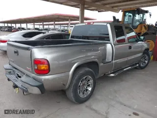 2003 GMC Sierra 1500 SLT with VIN 1GTEC19TX3Z212534, listed as a IAAI auction lot 41591390 with 158,457 mi miles. Bid and sale history available at carsss.com. Image 4.