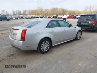 2011 Cadillac CTS Luxury with VIN 1G6DG5EY9B0143057, listed as a IAAI auction lot 42023052 with 72,576 mi miles and . Bid and sale history available at carsss.com. Image 4.