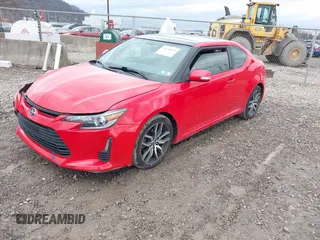2014 Scion tC z VIN JTKJF5C76E3078810, wystawiony jako IAAI lot #41638613 z przebiegiem 76 648 mil mil oraz . Historia ofert i sprzedaży dostępna na DreamBid. Obrazek 18.