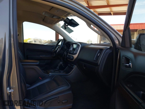 2017 GMC Canyon 4WD Denali z VIN 1GTG6EENXH1315022, wystawiony jako IAAI lot #42152968 z przebiegiem 108 933 mil mil oraz . Historia ofert i sprzedaży dostępna na DreamBid. Obrazek 5.