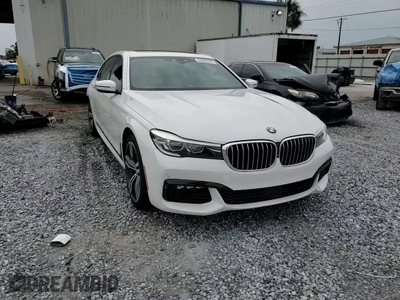 2016 BMW 7 Series 740i with VIN WBA7E2C52GG547112, listed as a Copart auction lot 63069355 with 76,867 mi miles and Salvage title. Bid and sale history available at DreamBid. Image 13.