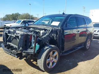 2017 Chevrolet Tahoe LS with VIN 1GNSCAKC8HR360581, listed as a IAAI auction lot 41365169 with 137,369 mi miles. Bid and sale history available at carsss.com. Image 2.