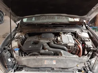 2015 Ford Fusion SE Hybrid with VIN 3FA6P0LU4FR151040, listed as a IAAI auction lot 41376155 with 120,486 mi miles. Bid and sale history available at carsss.com. Image 10.