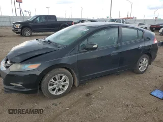 2010 Honda Insight EX with VIN JHMZE2H74AS043248, listed as a Copart auction lot 58588725 with 189,189 mi miles and Salvage title. Bid and sale history available at DreamBid. Image 1.