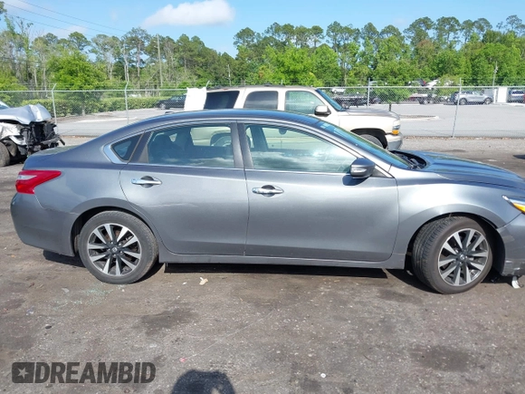2018 Nissan Altima 2.5 SR with VIN 1N4AL3AP3JC127999, listed as a IAAI auction lot 42016201 with 120,628 mi miles. Bid and sale history available at carsss.com. Image 13.