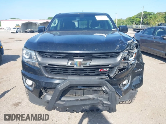 2020 Chevrolet Colorado 2WD Z71 z VIN 1GCGSDEN2L1122555, wystawiony jako IAAI lot #42096724 z przebiegiem 120 679 mil mil oraz . Historia ofert i sprzedaży dostępna na DreamBid. Obrazek 12.