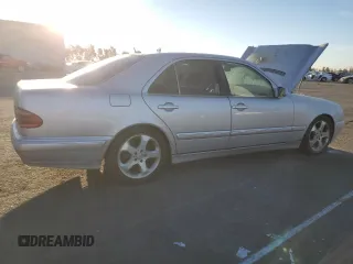 2002 Mercedes-Benz E-Class with VIN WDBJF65J32B496411, listed as a Copart auction lot 75690884 with 128,855 mi miles and Salvage Title. Bid and sale history available at carsss.com. Image 3.
