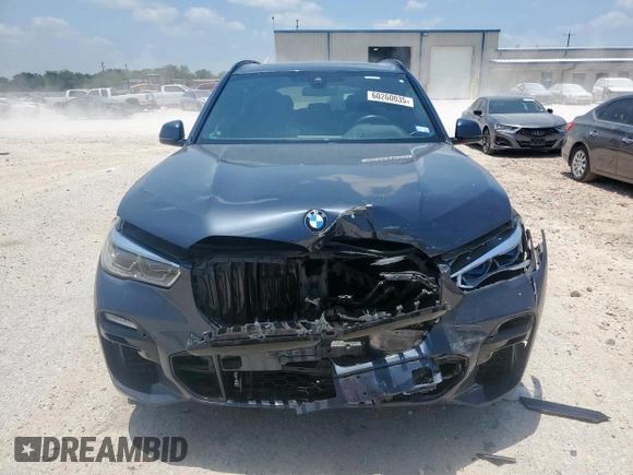 2021 BMW X5 xDrive40i z VIN 5UXCR6C01M9E82286, wystawiony jako Copart lot #60260035 z przebiegiem Nie podano mil oraz Szkoda całkowita • Salvage title. Historia ofert i sprzedaży dostępna na DreamBid. Obrazek 5.