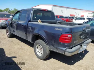 2001 Ford F-150 SuperCrew XLT with VIN 1FTRW08W81KF01853, listed as a IAAI auction lot 41850493 with 1 mi miles. Bid and sale history available at carsss.com. Image 3.