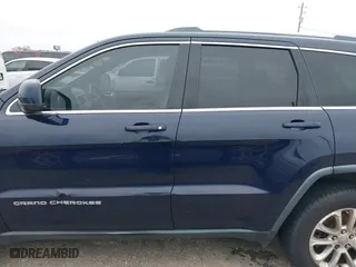 2014 Jeep Grand Cherokee Laredo with VIN 1C4RJEAG0EC120206, listed as a IAAI auction lot 41875054 with 180,153 mi miles. Bid and sale history available at carsss.com. Image 14.