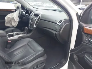 2012 Cadillac SRX Performance Collection with VIN 3GYFNBE38CS547423, listed as a IAAI auction lot 42276365 with 157,786 mi miles and . Bid and sale history available at DreamBid. Image 5.
