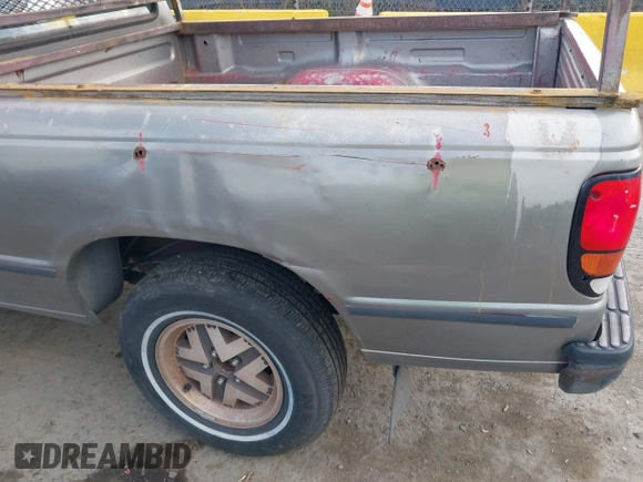 1994 Mazda B-Series Truck z VIN 4F4CR12A3RTM46760, wystawiony jako IAAI lot #41916078 z przebiegiem 276 129 mil mil oraz . Historia ofert i sprzedaży dostępna na DreamBid. Obrazek 6.