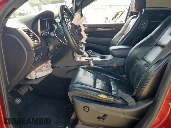2015 Jeep Grand Cherokee Overland with VIN 1C4RJECG3FC686536, listed as a Copart auction lot 61058215 with 132,282 mi miles and Salvage title. Bid and sale history available at DreamBid. Image 7.