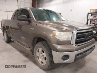 2011 Toyota Tundra with VIN 5TFUY5F16BX171501, listed as a IAAI auction lot 42282175 with 281,311 mi miles and . Bid and sale history available at DreamBid. Image 1.
