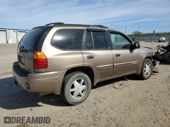 2003 GMC Envoy SLT z VIN 1GKDS13S032134647, wystawiony jako Copart lot #50137325 z przebiegiem 217 878 mil mil oraz Szkody całkowita. Historia ofert i sprzedaży dostępna na DreamBid. Obrazek 3.
