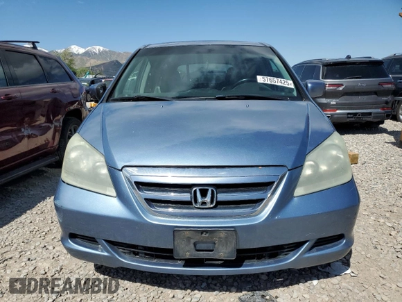 2006 Honda Odyssey EX-L z VIN 5FNRL38686B025733, wystawiony jako Copart lot #57657425 z przebiegiem 214 303 mil mil oraz Szkoda całkowita • Salvage title. Historia ofert i sprzedaży dostępna na DreamBid. Obrazek 5.