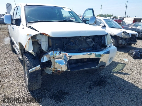 2005 Nissan Titan LE with VIN 1N6AA07B65N506688, listed as a IAAI auction lot 42086502 with 245,661 mi miles and . Bid and sale history available at DreamBid. Image 6.