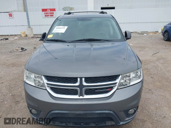 2013 Dodge Journey SXT with VIN 3C4PDDBGXDT650886, listed as a IAAI auction lot 41864331 with 224,579 mi miles and . Bid and sale history available at DreamBid. Image 12.
