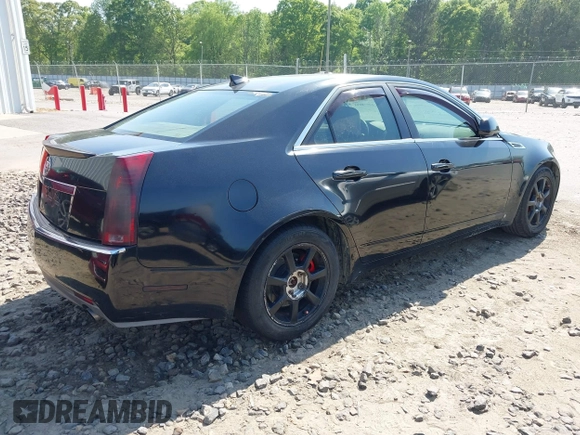 2009 Cadillac CTS RWD w/1SA with VIN 1G6DF577390128796, listed as a IAAI auction lot 42078153 with 257,757 mi miles. Bid and sale history available at carsss.com. Image 4.