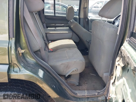 2007 Jeep Commander Sport with VIN 1J8HH48KX7C622714, listed as a IAAI auction lot 42257498 with 165,438 mi miles and . Bid and sale history available at DreamBid. Image 8.
