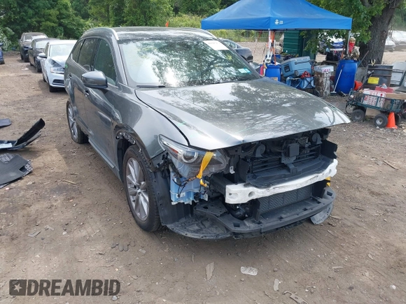 2020 Mazda CX-9 Grand Touring with VIN JM3TCBDY4L0408920, listed as a IAAI auction lot 42325272 with 45,837 mi miles and . Bid and sale history available at DreamBid. Image 6.