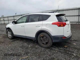 2014 Toyota RAV4 LE with VIN JTMBFREV9ED079488, listed as a Copart auction lot 52695515 with 106,097 mi miles and Salvage Title. Bid and sale history available at DreamBid. Image 2.