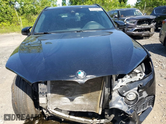 2018 BMW X5 M z VIN 5YMKT6C54J0Y83460, wystawiony jako Copart lot #57874275 z przebiegiem 58 656 mil mil oraz Szkody całkowita. Historia ofert i sprzedaży dostępna na DreamBid. Obrazek 5.
