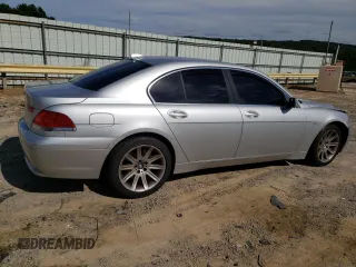 2003 BMW 7 Series 745i with VIN WBAGL63473DP68267, listed as a Copart auction lot 69923064 with 100,468 mi miles and Salvage title. Bid and sale history available at DreamBid. Image 3.
