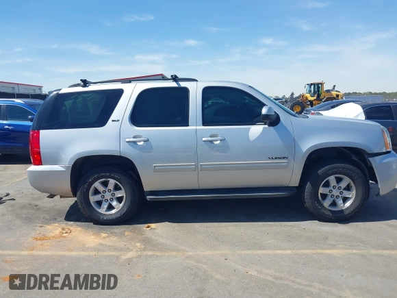 2014 GMC Yukon SLT with VIN 1GKS1CE04ER121301, listed as a IAAI auction lot 41825056 with 141,562 mi miles. Bid and sale history available at carsss.com. Image 14.