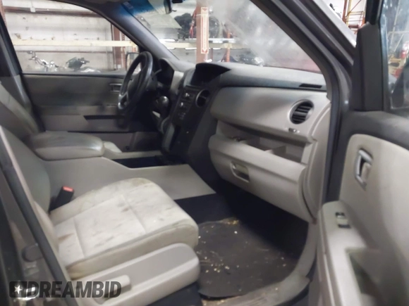 2012 Honda Pilot LX with VIN 5FNYF4H21CB085788, listed as a IAAI auction lot 41690873 with 125,165 mi miles and . Bid and sale history available at carsss.com. Image 5.